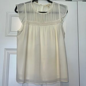 Cream colored blouse